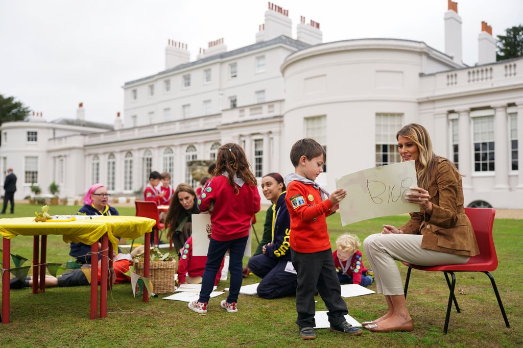  First Lady Melania Trump and Catherine, Princess of Wales speak with members of the Scouts' Squirrels programme in the grounds of Frogmore Cottage, during the State visit by the President of the United States of America and U.S. First Lady Melania Trump