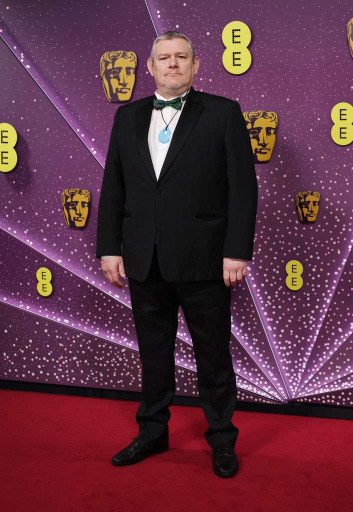 John Davidson assiste aux EE BAFTA Film Awards 2026