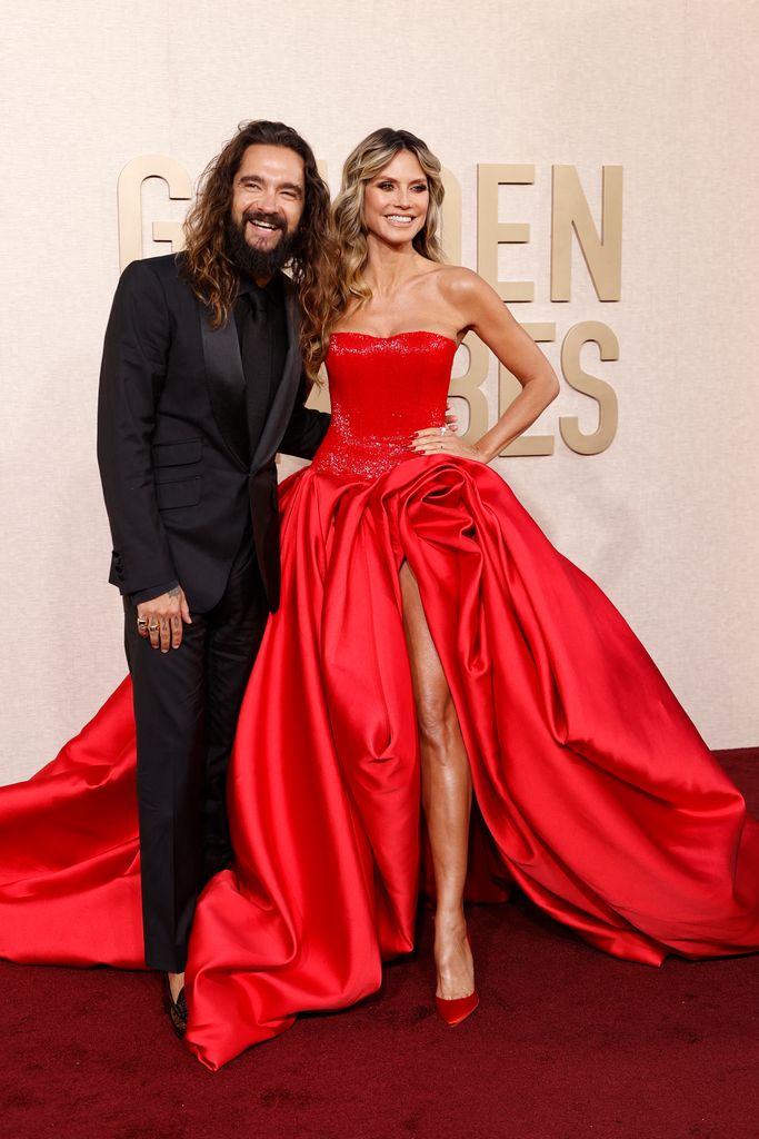 Heidi Klum, 50, steals the show in plunging gown as she puts on loved ...