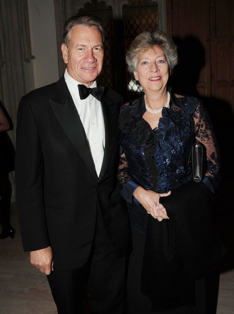 Michael Portillo with His wife Carolyn Eadie dressed in black tie pose for photo at the 2010 Man Booker Prize 