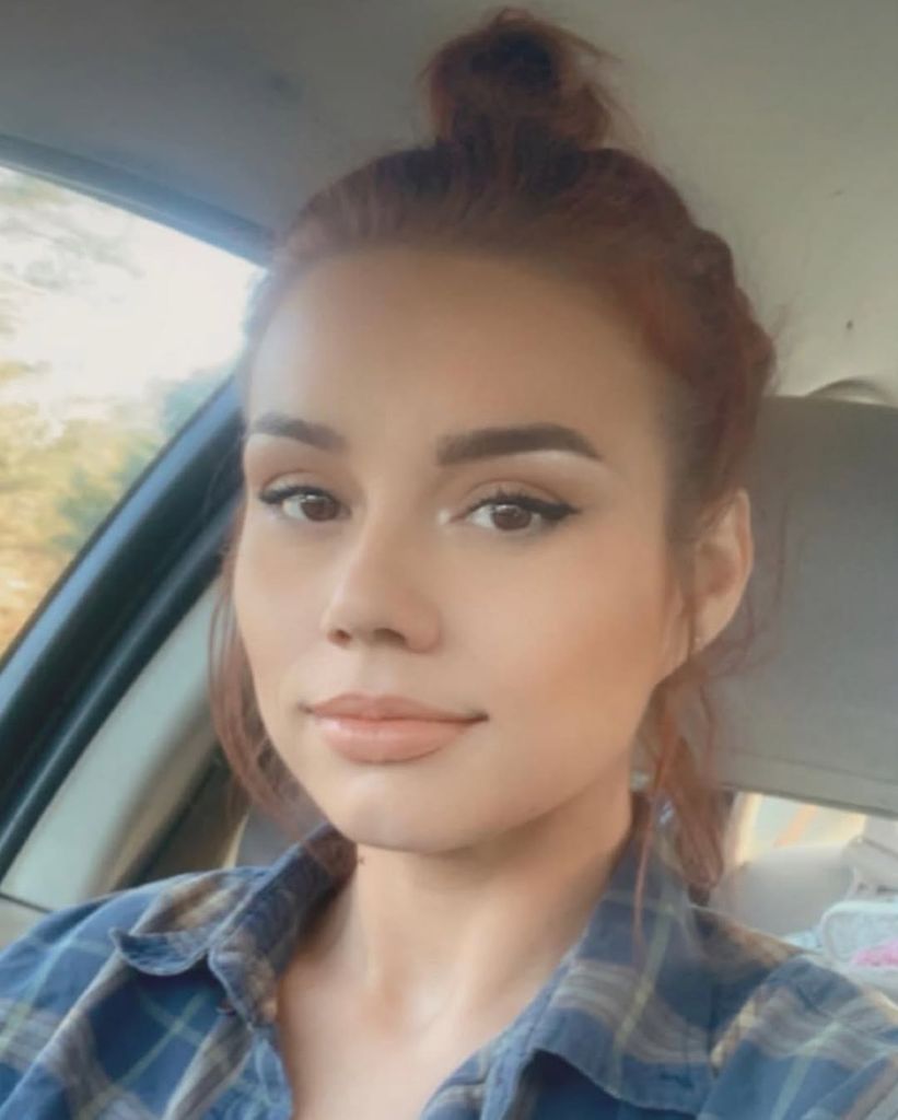 Whitney looking at the camera 