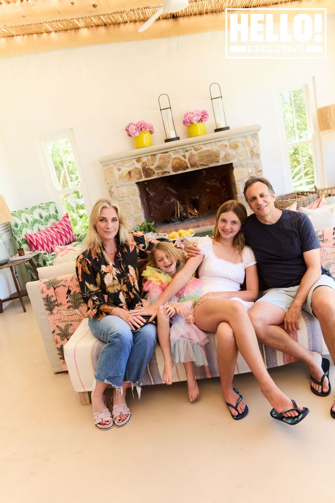 Tabitha Webb with husband Gavin Ferrar and daughters Primrose and Betsey posing at South Africa home