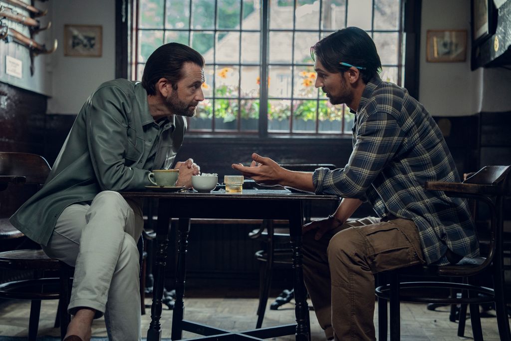 Screengrab of The Thursday Murder Club featuring David Tennant and Henry Lloyd-Hughes