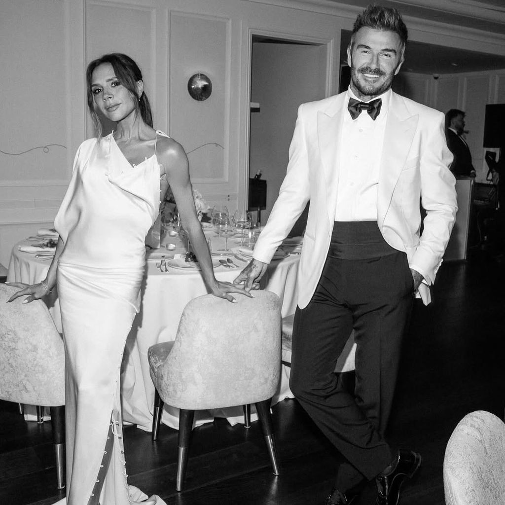 David and Victoria Beckham holding hands