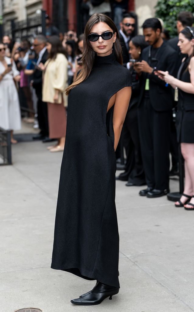Emily Ratajkowski is seen arriving at the Calvin Klein fashion show during New York Fashion Week in black knit 