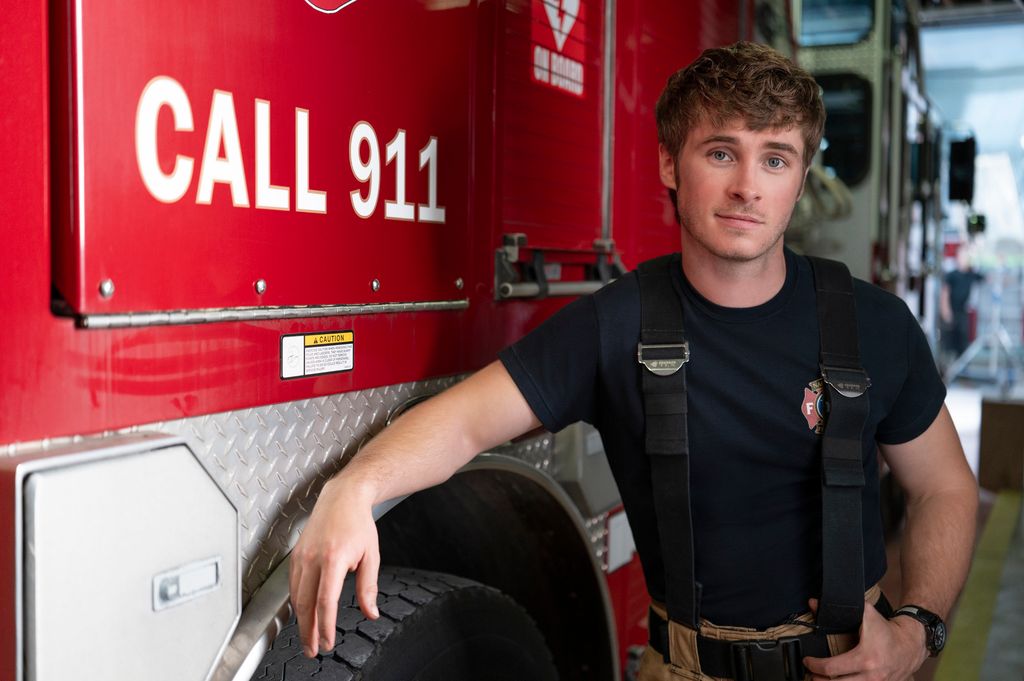 Michael Provost in a promo shot for 9-1-1: Nashville