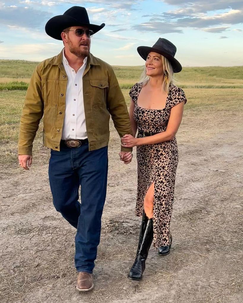 Cynthia and Cole Hauser holding hands in Montana 