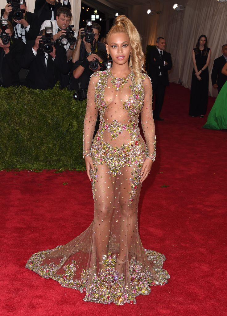 Beyoncé wore a sheer jeweled Givenchy dress at the 2015 Met Gala, delivering an unforgettable nearly-nude fashion moment.