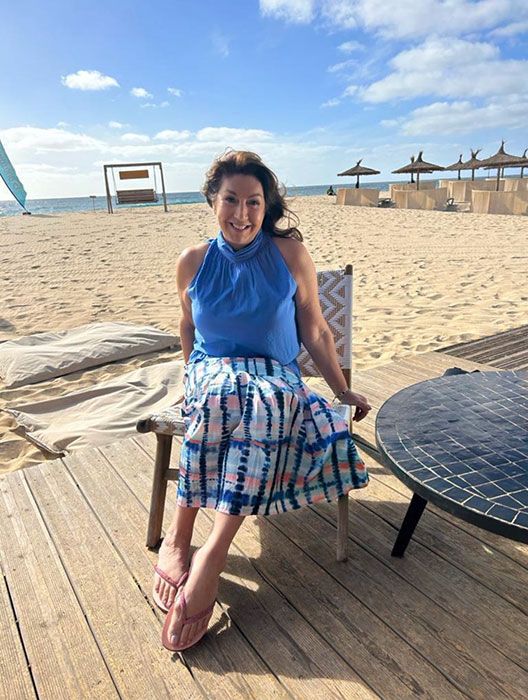 Jane McDonald in her blue beach outfit