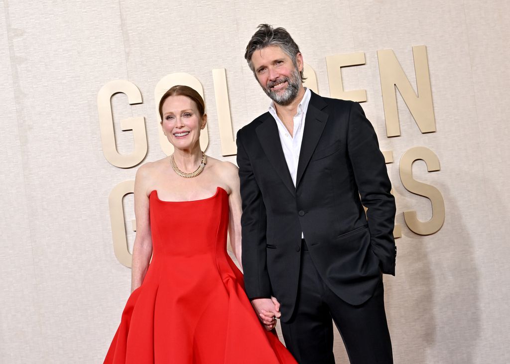 BEVERLY HILLS, CALIFORNIA - JANUARY 07: Julianne Moore and Bart Freundlich attend the 81st Annual Golden Globe Awards at The Beverly Hilton on January 07, 2024 in Beverly Hills, California. (Photo by Axelle/Bauer-Griffin/FilmMagic)