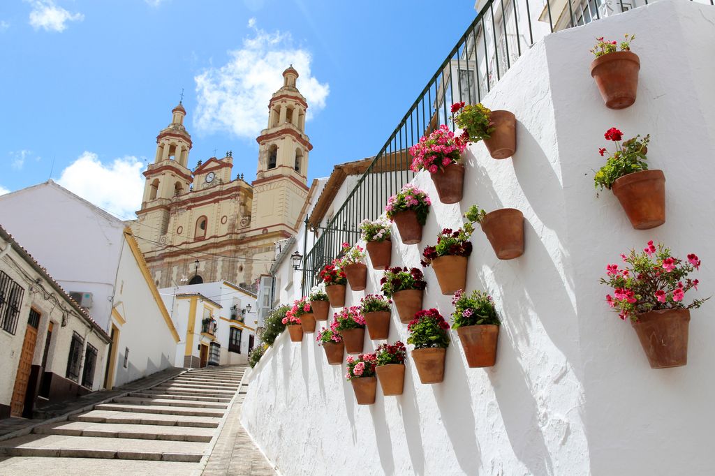 Walking towards the church Parroquia de Nuestra SeÃ±ora de la EncarnaciÃ³n (the Parish of Our Lady of the Incarnation) of Olvera, one of the White Towns (Pueblos Blancos) of Andalusia