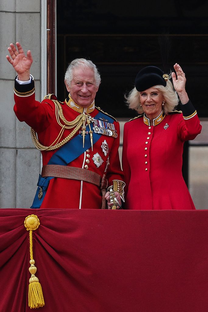 King Charles and Queen Camilla wave at crowds at Trooping the Colour