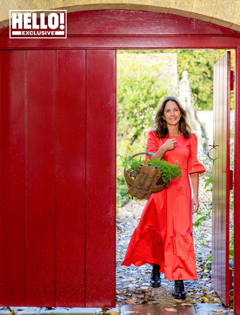 Nicola Reed in red dress at her Wiltshire home 