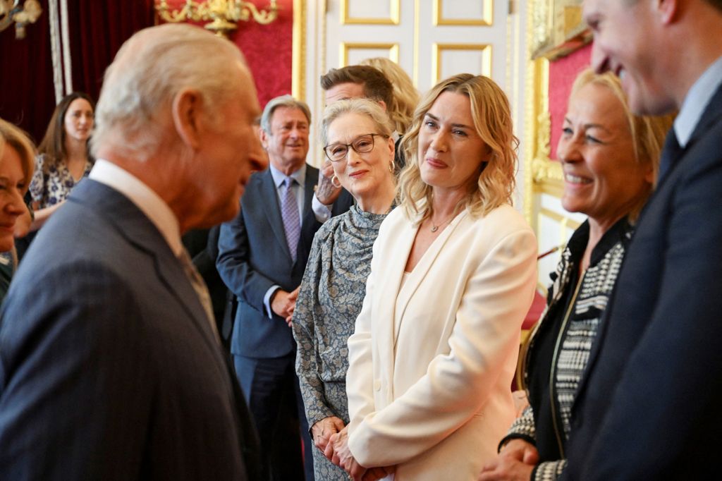 Meryl Streep and Kate Winslet look at Britain's King Charles as they attend the King's Foundation Awards ceremony, on the 35th anniversary of The King's Foundation, at St James's Palace on June 12, 2025 in London, England.