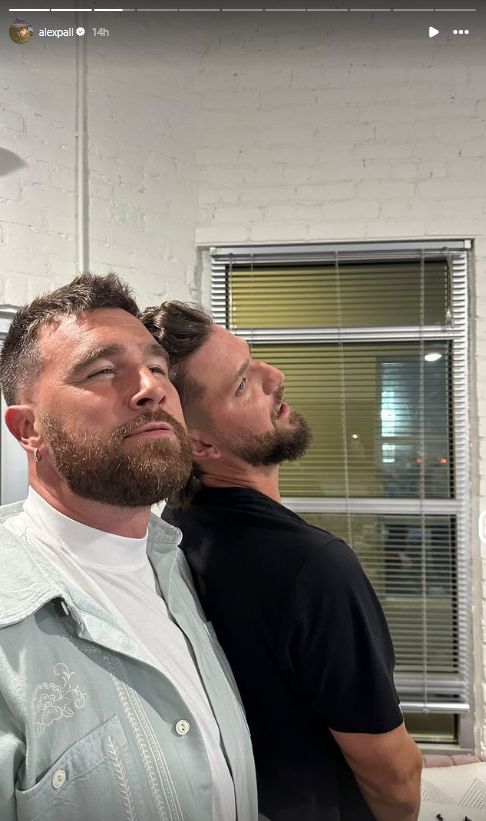 Alex Pall and Travis Kelce pose with their heads touching