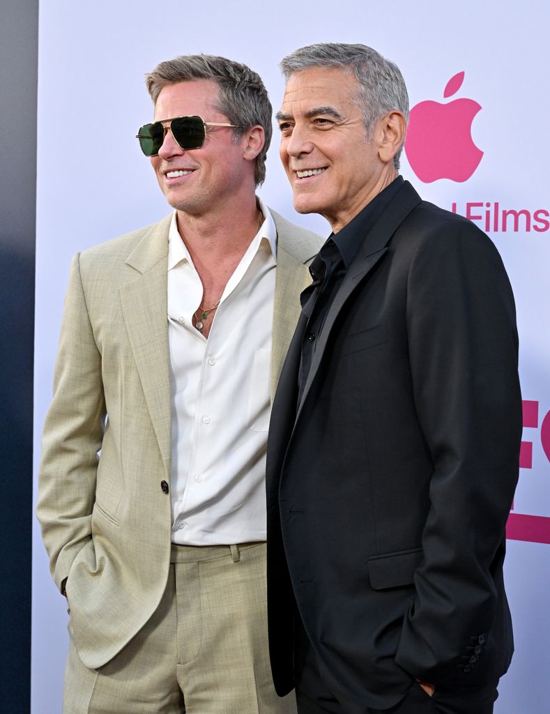 Brad Pitt and George Clooney attend the Los Angeles Premiere of The Apple Original Film "Wolfs" at TCL Chinese Theatre on September 18, 2024 in Hollywood, California.