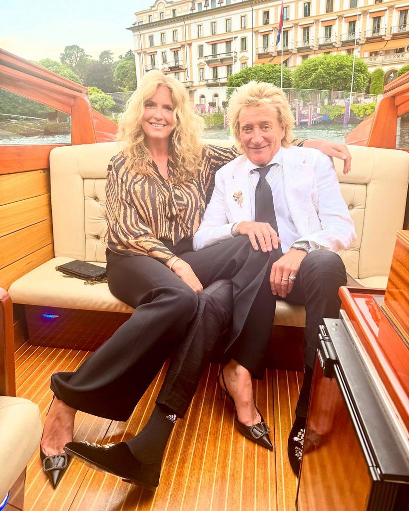 couple riding boat in italy 