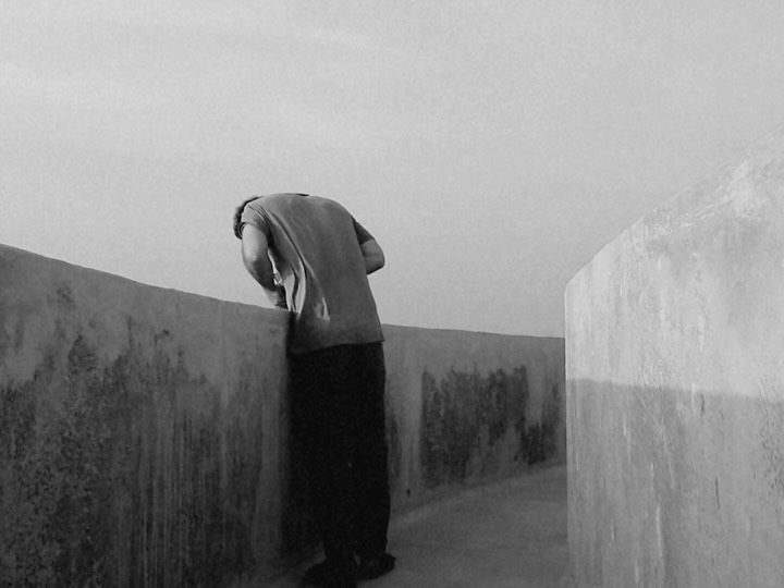 Manuel Garcia-Rulfo looks over a concrete walkway at the water in a video shared on Instagram by Audrey McGraw