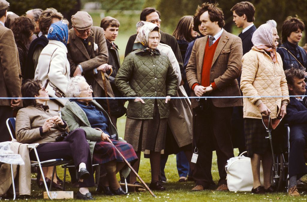 WINDSOR - MAY 12: Queen Elizabeth II in the crowd, watching the Carriage Driving event, at the Windsor Horse Show on May 12, 1984. (Photo by David Levenson/Getty Images)