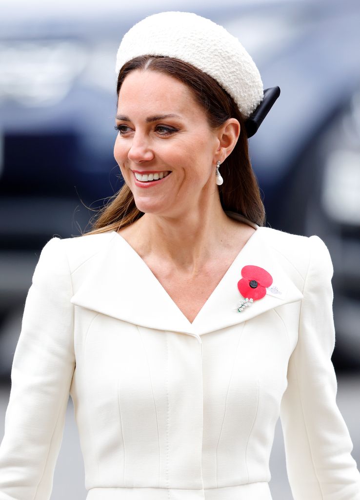 Kate Middleton in white fluffy headband at Anzac Day Service of Commemoration and Thanksgiving at Westminster Abbey on April 25, 2022 in London