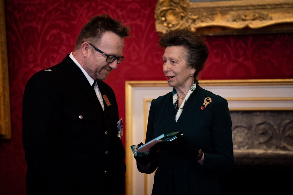 The Princess Royal presents the Princess Royal award to Jonathan Firth during the Butler Trust awards