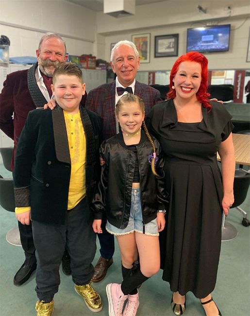 Strawbridge family smile for photo in dressing room while on tour in Australia