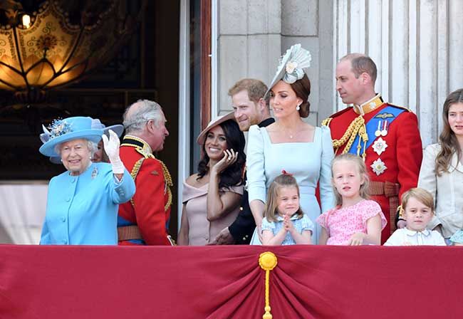 Harry and Meghan on the royal balcony with Charles 