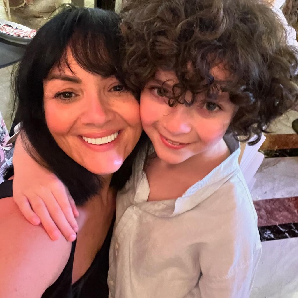 Martine McCutcheon cuddling her son Rafferty