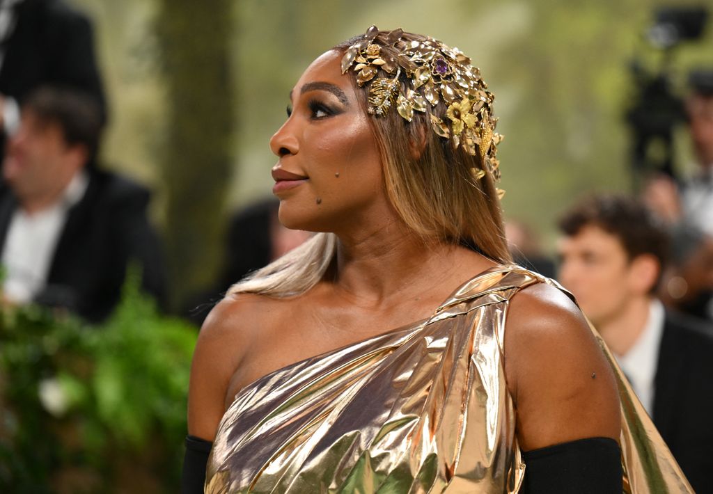 Serena Williams in gold ethereal headpiece