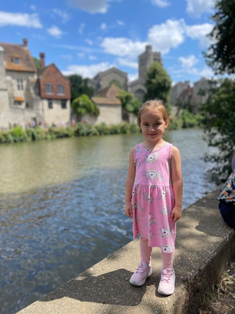 Ella Jordan beside a river