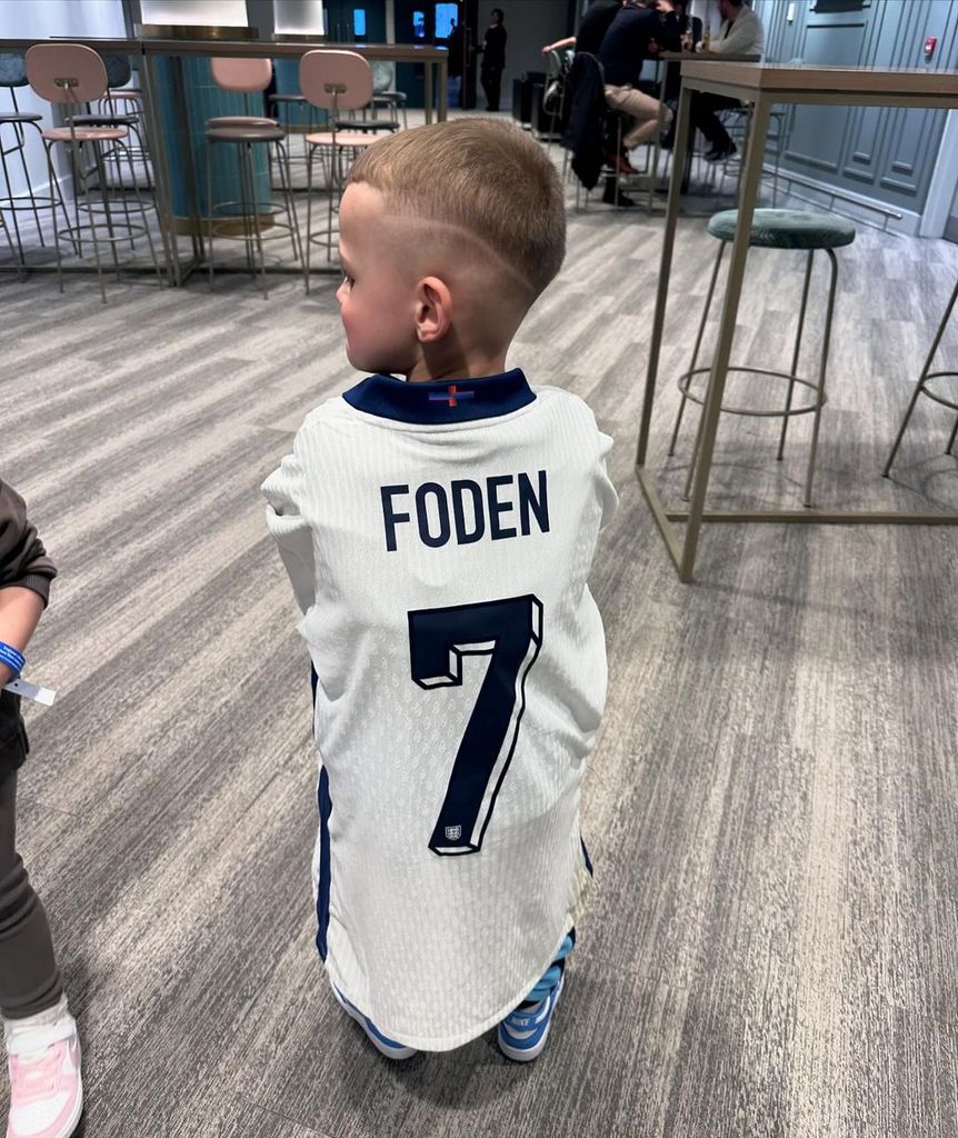 Phil Foden's son Ronnie in a football jersey