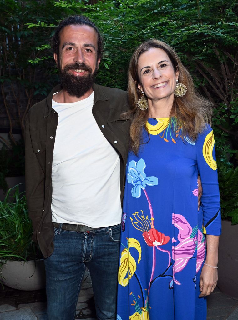 Livia Firth dengan kakaknya Alessandro Giuggioli tersenyum satu sama lain