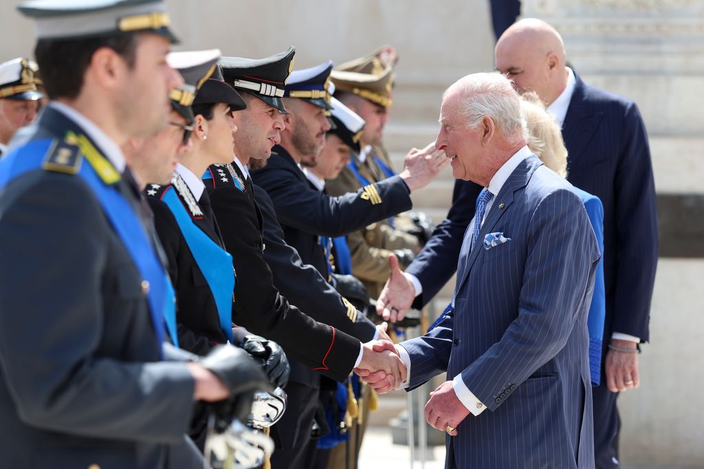 King Charles shaking hands with soldiers