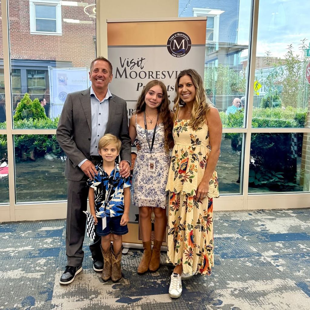 Greg Biffle with his wife Cristina, daughter Emma and son Ryder at the NC Auto Racing Hall of Fame ceremony in September 2025, shared on Instagram