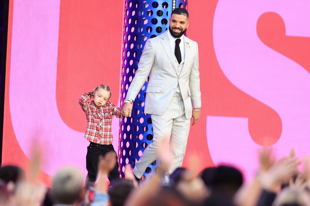 Drake accepts Artist of the Decade with son Adonis on stage during the 2021 Billboard Music Awards held at the Microsoft Theater on May 23, 2021 in Los Angeles, California