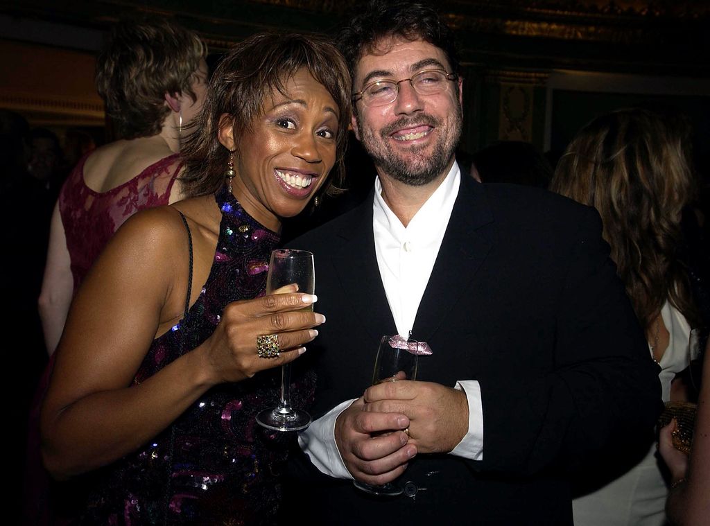 Trisha Goddard and Peter Gainfrancesco with drinks