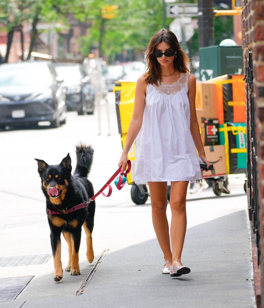 Emily Ratajkowski sported Prada's cotton poplin mini dress during a walk in New York