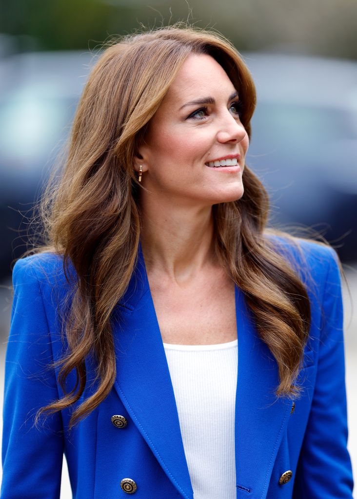 Kate Middleton in blue blazer and white shirt