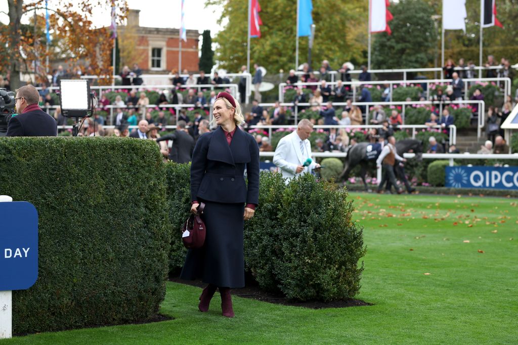 Zara Tindall in the parade ring in navy coat