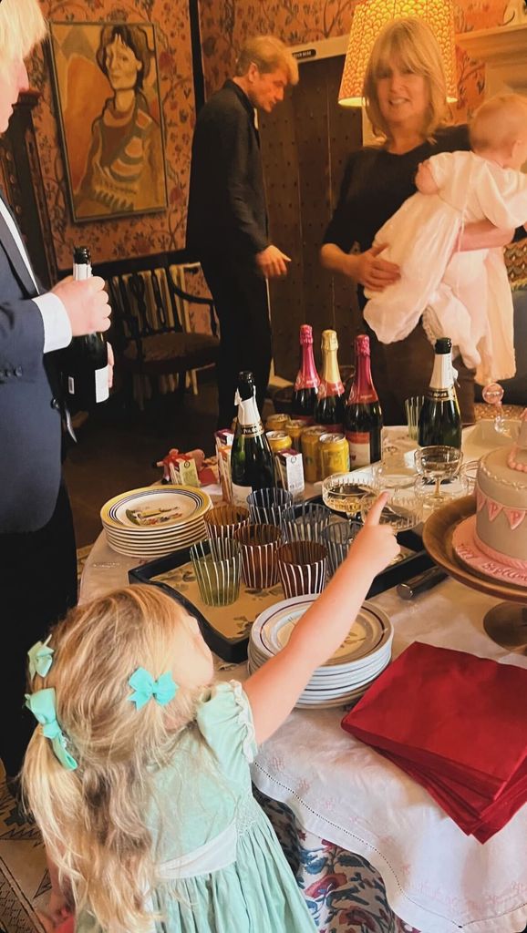 A photo of a little girl pointing