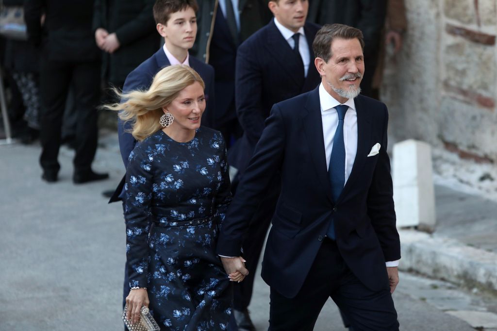 Pavlos, former Crown Prince of Greece, and his wife Marie-Chantal arrive for the wedding of Nikolaos De Grece with Chrysi Vardinogianni at the Church of Agios Nikolaos Rangavas in Athens