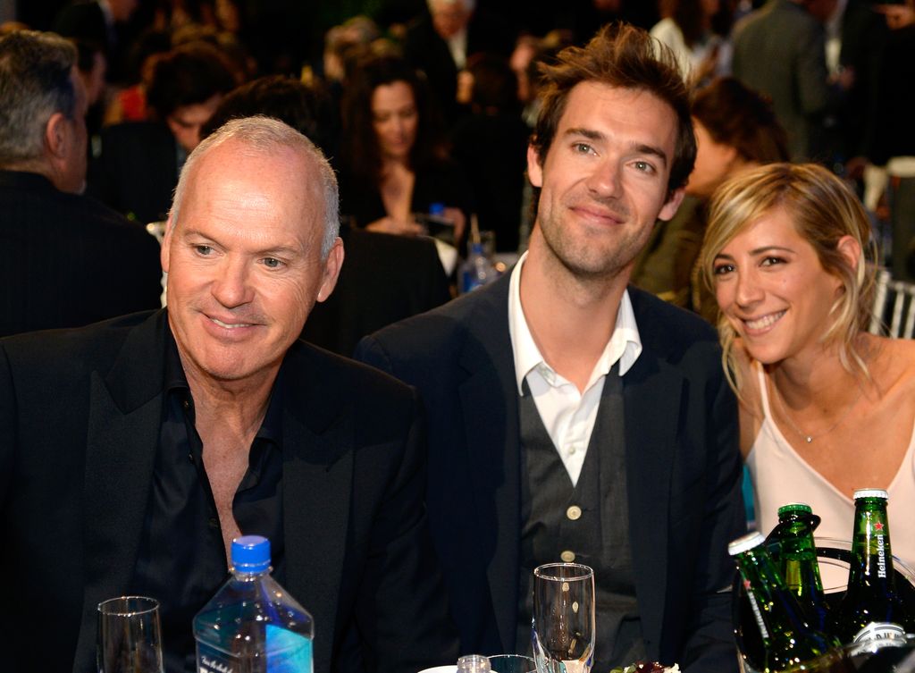 Michael Keaton, Sean Douglas, and Rachel Bartov attend the 2015 Film Independent Spirit Awards at Santa Monica Beach on February 21, 2015 in Santa Monica, California