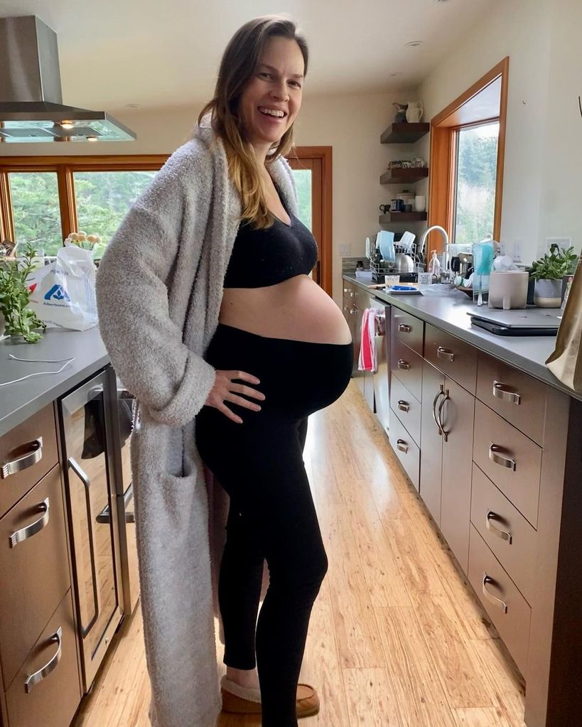 Hilary Swank showcasing her baby bump