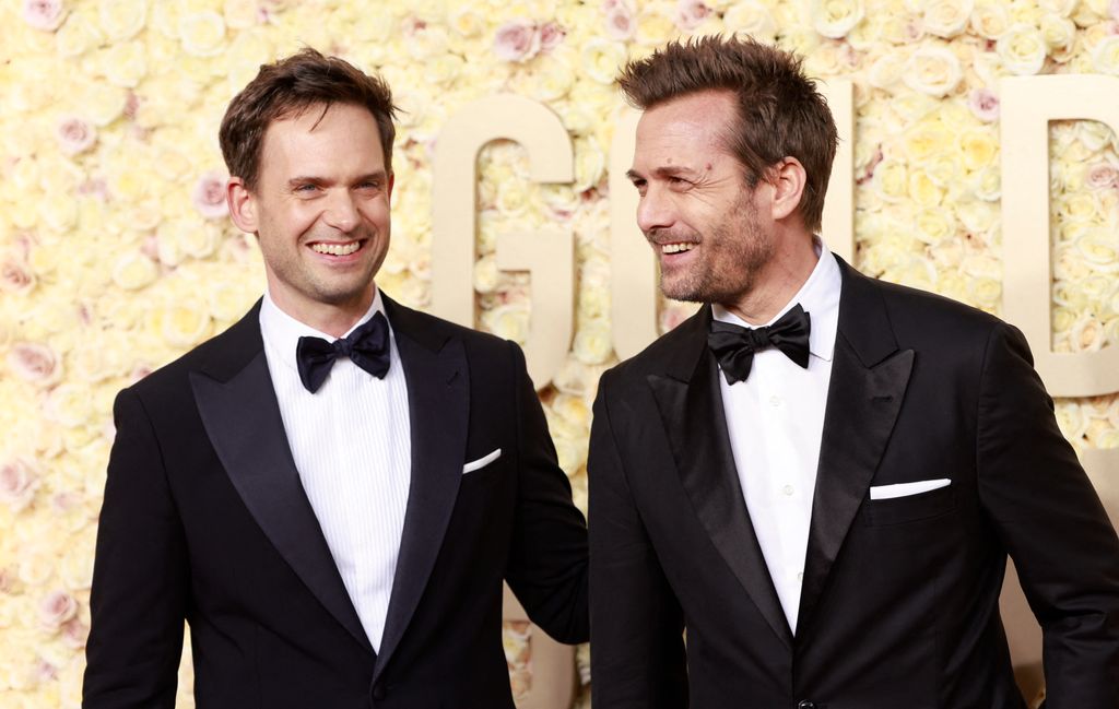 Gabriel Macht and  Patrick J. Adams arrive for the 81st annual Golden Globe Awards at The Beverly Hilton hotel in Beverly Hills, California, on January 7, 2024