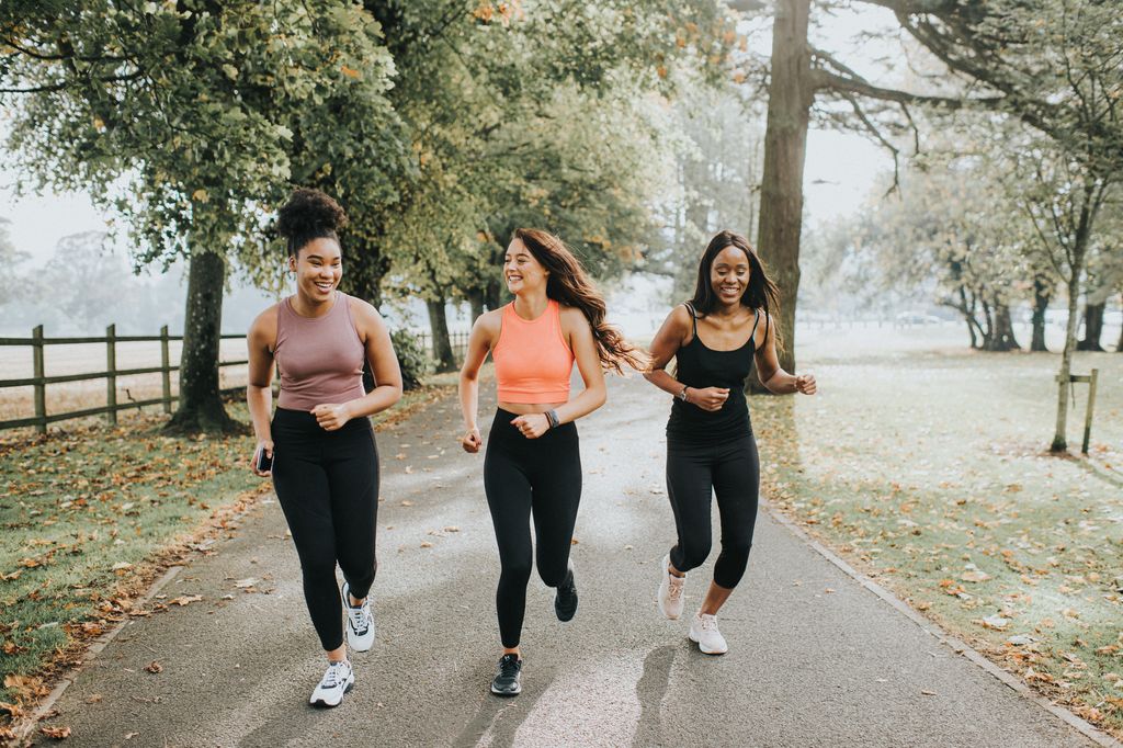 Three women running with each other