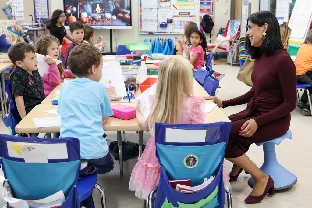Second lady Usha Vance speaks to students during a visit to DeLalio Elementary School on Marine Corps Air Station New River on November 19, 2025