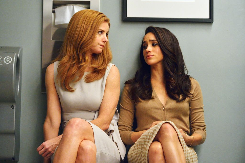 Sarah Rafferty as Donna Paulsen, Meghan Markle as Rachel Zane in Suits