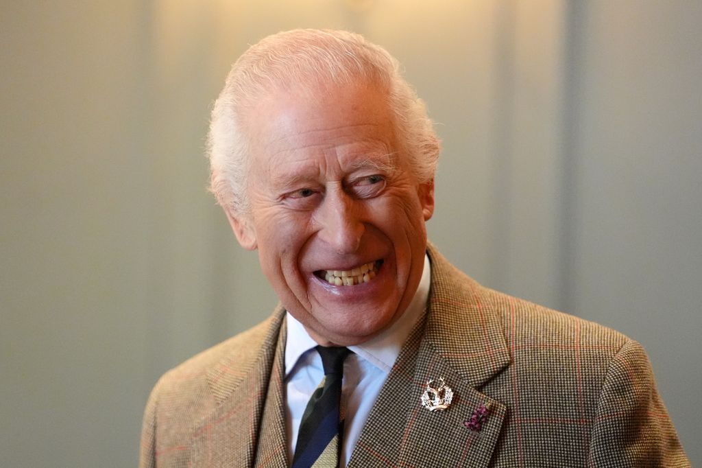 King Charles III reacts during a visit to the Gordon Highlanders Museum to view recent renovations on January 20, 2025 in Aberdeen, United Kingdom.