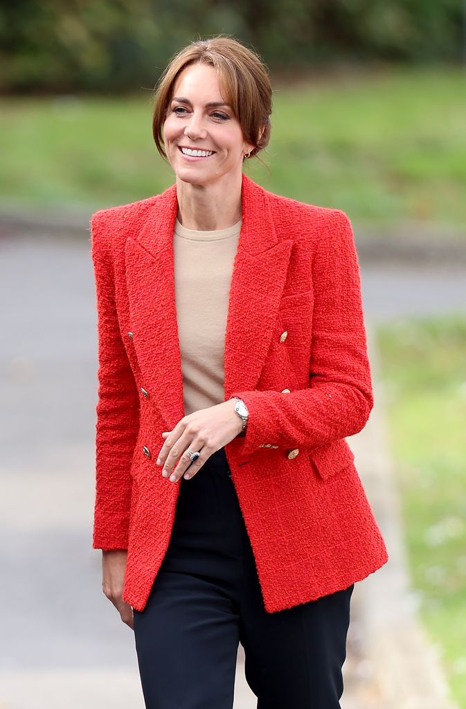 Catherine in red blazer with hair up