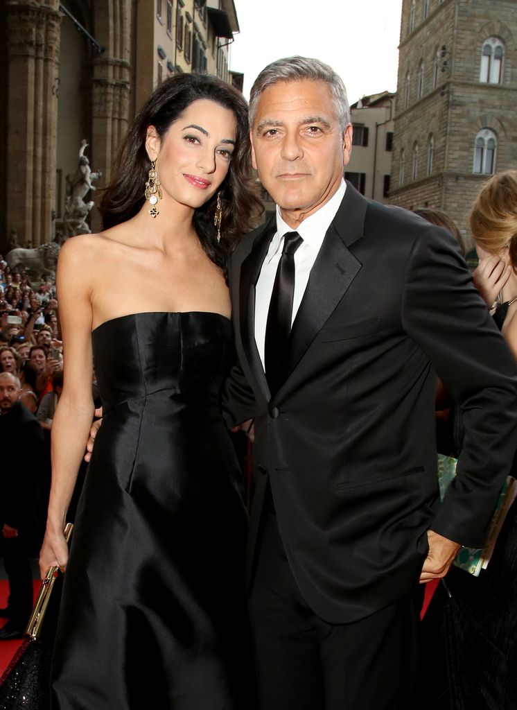 George Clooney (R) and Amal Alamuddin attend the Celebrity Fight Night gala celebrating Celebrity Fight Night in Italy benefitting the Andrea Bocelli Foundation and the Muhammad Ali Parkinson Center in Florence, Italy in September 2014.